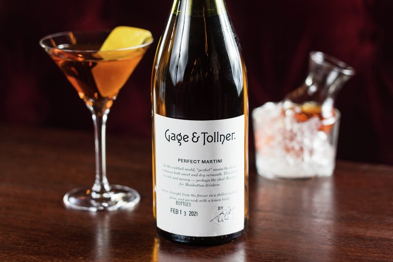 A cocktail and a bottle.