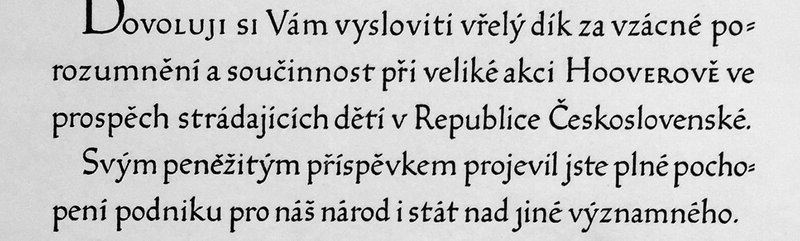 A paragraph of calligraphic text in Czech with diacritics